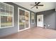 Covered patio with ceiling fan, sliding glass door, and backyard access at 1476 Burriss Rd., Conway, SC 29526