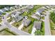 Aerial view of a home in a well-maintained neighborhood, featuring manicured lawns and mature trees at 148 Long Leaf Pine Dr., Conway, SC 29526