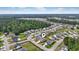 Aerial view of a residential neighborhood, showcasing the home's location near green space and other community amenities at 148 Long Leaf Pine Dr., Conway, SC 29526