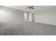 A spacious bedroom with plush carpet, light walls, and view of an open doorway at 148 Long Leaf Pine Dr., Conway, SC 29526