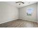 Bright bedroom featuring a window and ceiling fan at 148 Long Leaf Pine Dr., Conway, SC 29526