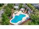 Aerial view of the community pool and recreation area, surrounded by lush greenery and amenities for residents at 148 Long Leaf Pine Dr., Conway, SC 29526