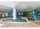 Indoor wading pool with brick flooring, stylish tile accents, and soothing aquatic environment at 1501 Ocean Blvd. S # 1249, Myrtle Beach, SC 29577