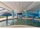 Indoor lazy river with umbrella accents and inviting aquatic environment at 1501 Ocean Blvd. S # 1249, Myrtle Beach, SC 29577