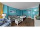 Inviting living room with comfortable seating and ocean-themed decor for a relaxing atmosphere at 1501 Ocean Blvd. S # 1249, Myrtle Beach, SC 29577