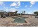 Outdoor pool area with lounge chairs and palm trees, creating a relaxing vacation atmosphere at 1501 Ocean Blvd. S # 1249, Myrtle Beach, SC 29577