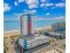 Aerial view of The Palace Resort with a large parking garage and beach access at 1605 S Ocean Blvd. S # 105, Myrtle Beach, SC 29577
