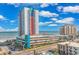 Aerial view of The Palace Resort, showcasing its height and proximity to the ocean at 1605 S Ocean Blvd. S # 105, Myrtle Beach, SC 29577