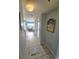 Hallway leading to bedroom and bath with tile flooring at 1605 S Ocean Blvd. S # 105, Myrtle Beach, SC 29577