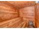 Wooden sauna with 'no water on rocks' sign and wooden benches at 1605 S Ocean Blvd. S # 105, Myrtle Beach, SC 29577