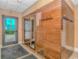 Sauna area featuring a door, coat rack and signage at 1605 S Ocean Blvd. S # 105, Myrtle Beach, SC 29577