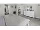 Spacious bedroom featuring a white dresser, gray carpet, and serene decor, offering a restful retreat at 191 Marley Blue Dr., Little River, SC 29566