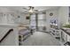 Upstairs bedroom featuring two beds with coastal themed decor and a ceiling fan at 191 Marley Blue Dr., Little River, SC 29566