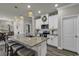 Bright kitchen featuring granite countertops, pendant lighting, and modern appliances for culinary delight at 191 Marley Blue Dr., Little River, SC 29566