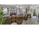 Living room featuring comfortable leather sofas, wood flooring, and an open layout for Gathering gatherings at 191 Marley Blue Dr., Little River, SC 29566