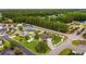 Desirable location featuring a private backyard, lush landscaping, and mature trees creating a serene setting at 196 La Patos Dr., Myrtle Beach, SC 29588