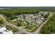 Gorgeous aerial view of neighborhood featuring community pool, lush landscaping and mature trees at 196 La Patos Dr., Myrtle Beach, SC 29588