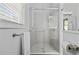 Modern bathroom featuring a glass-enclosed shower with gray tiling and silver hardware at 196 La Patos Dr., Myrtle Beach, SC 29588