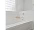 Relaxing bathroom featuring a soaking tub and window for natural light at 196 La Patos Dr., Myrtle Beach, SC 29588