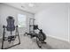 Bright exercise room with rowing machine and inversion table at 196 La Patos Dr., Myrtle Beach, SC 29588