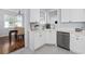 Bright kitchen nook with white cabinets, modern countertops, and stainless steel appliances at 196 La Patos Dr., Myrtle Beach, SC 29588
