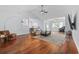 Open living room with hardwood floors, vaulted ceiling, and a comfortable seating arrangement at 196 La Patos Dr., Myrtle Beach, SC 29588