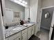 Bathroom features double sinks with granite counters and plentiful storage space underneath, plus a linen closet at 200 Ponte Vedra Dr., Murrells Inlet, SC 29576