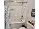 Bathroom with tub and shower combination has a cute shower curtain and a built in shelf at 200 Ponte Vedra Dr., Murrells Inlet, SC 29576