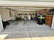 Spacious two-car garage with ample storage space, featuring an epoxy floor at 200 Ponte Vedra Dr., Murrells Inlet, SC 29576