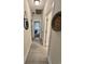 Neutral-toned hallway with access to multiple rooms offers privacy and transitions between living spaces at 200 Ponte Vedra Dr., Murrells Inlet, SC 29576