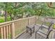 Relaxing balcony view with seating, overlooking lush greenery and mature trees at 201 Westleton Dr. # 10-I, Myrtle Beach, SC 29572
