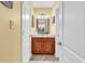 Bathroom featuring double sinks, granite countertop, and two mirrors with lighting at 201 Westleton Dr. # 10-I, Myrtle Beach, SC 29572