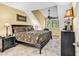 Bedroom featuring a queen sized bed, black furnishings, and neutral toned walls at 201 Westleton Dr. # 10-I, Myrtle Beach, SC 29572