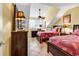 Bedroom with two beds, a ceiling fan, and a desk area by a large window at 201 Westleton Dr. # 10-I, Myrtle Beach, SC 29572
