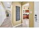Hallway with large ceramic tiles leads into the kitchen at 201 Westleton Dr. # 10-I, Myrtle Beach, SC 29572