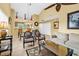 Open living area with tile flooring and adjacent dining area with stylish decor at 201 Westleton Dr. # 10-I, Myrtle Beach, SC 29572
