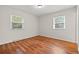 Bedroom with two windows providing ample natural light at 203 Longwood Ln., Conway, SC 29527