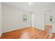 Bedroom with window and closet with mirror doors at 203 Longwood Ln., Conway, SC 29527
