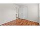 This bedroom features beautiful wood floors, a closet for storage, and access to the bathroom at 203 Longwood Ln., Conway, SC 29527