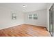 Bright bedroom with two windows and neutral wall color at 203 Longwood Ln., Conway, SC 29527