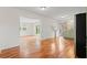 Open-concept kitchen with hardwood floors and neutral tones at 203 Longwood Ln., Conway, SC 29527