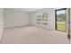 Bright, carpeted living room with lots of natural light at 203 Longwood Ln., Conway, SC 29527
