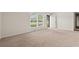Bright, carpeted living room with lots of natural light at 203 Longwood Ln., Conway, SC 29527