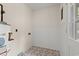 Utility room with water heater and door to outside at 203 Longwood Ln., Conway, SC 29527
