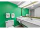Bathroom with a long white vanity and a mirror at 2207 S Ocean Blvd. # 1517, Myrtle Beach, SC 29577