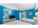 Brightly painted bedroom with two beds, dresser and flat screen television at 2207 S Ocean Blvd. # 1517, Myrtle Beach, SC 29577
