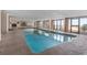 Bright indoor pool with lounge seating areas and ocean views at 2207 S Ocean Blvd. # 1517, Myrtle Beach, SC 29577