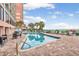 Enjoy the expansive outdoor pool with tables and lounge chairs at 2207 S Ocean Blvd. # 1517, Myrtle Beach, SC 29577