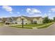 Street view of a well-maintained home showcasing its manicured lawn and two-car garage at 2300 Lark Sparrow St., Myrtle Beach, SC 29577