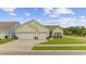 Charming single-story home featuring a well-manicured lawn and a two-car garage at 2300 Lark Sparrow St., Myrtle Beach, SC 29577